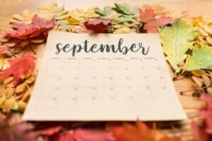 calendar for september on table with red yellow a 2021 09 24 03 09 21 utc