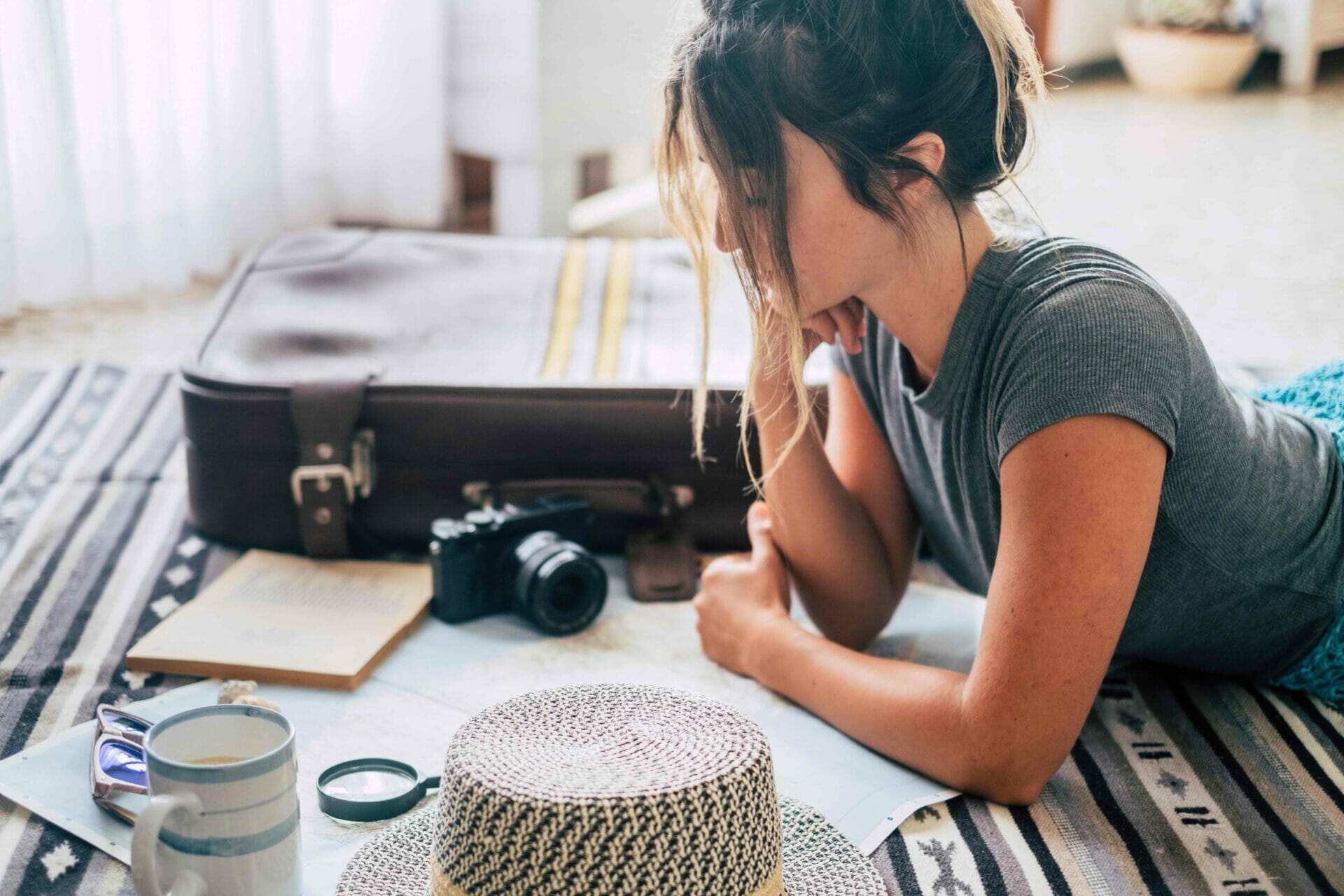 caucasian woman planning vacation travel with map 2021 09 02 03 56 19 utc