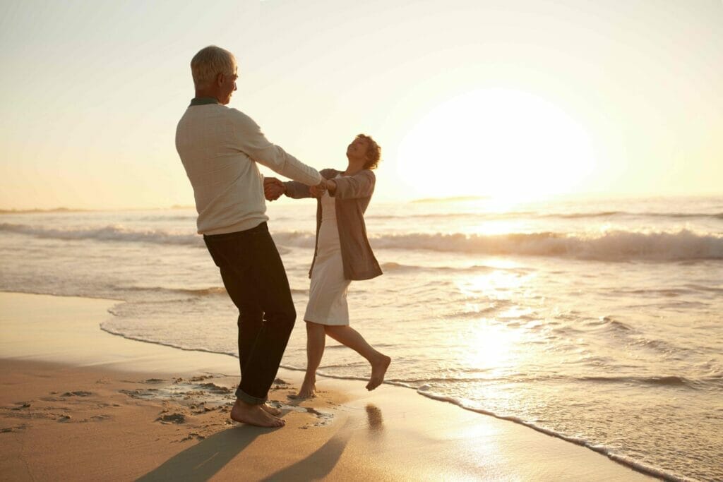 Romantic senior couple enjoying a day at the beach