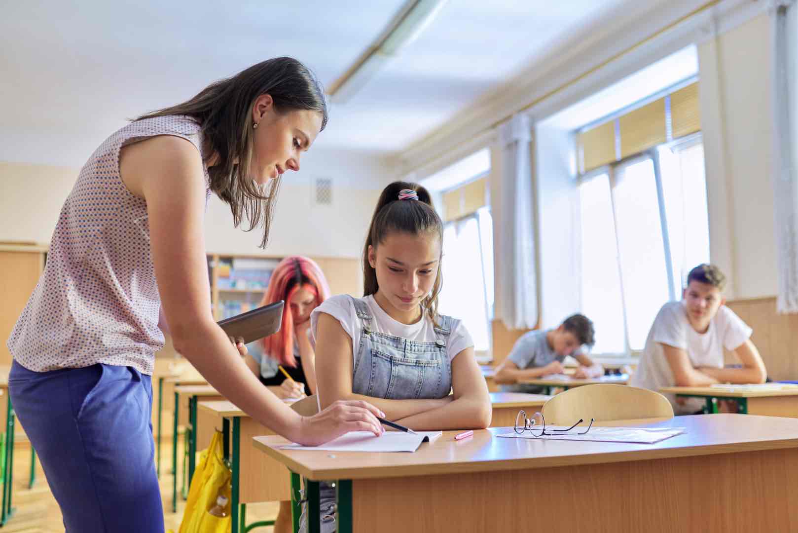 young woman teacher teaches lesson in class of tee 2022 01 20 19 59 08 utc