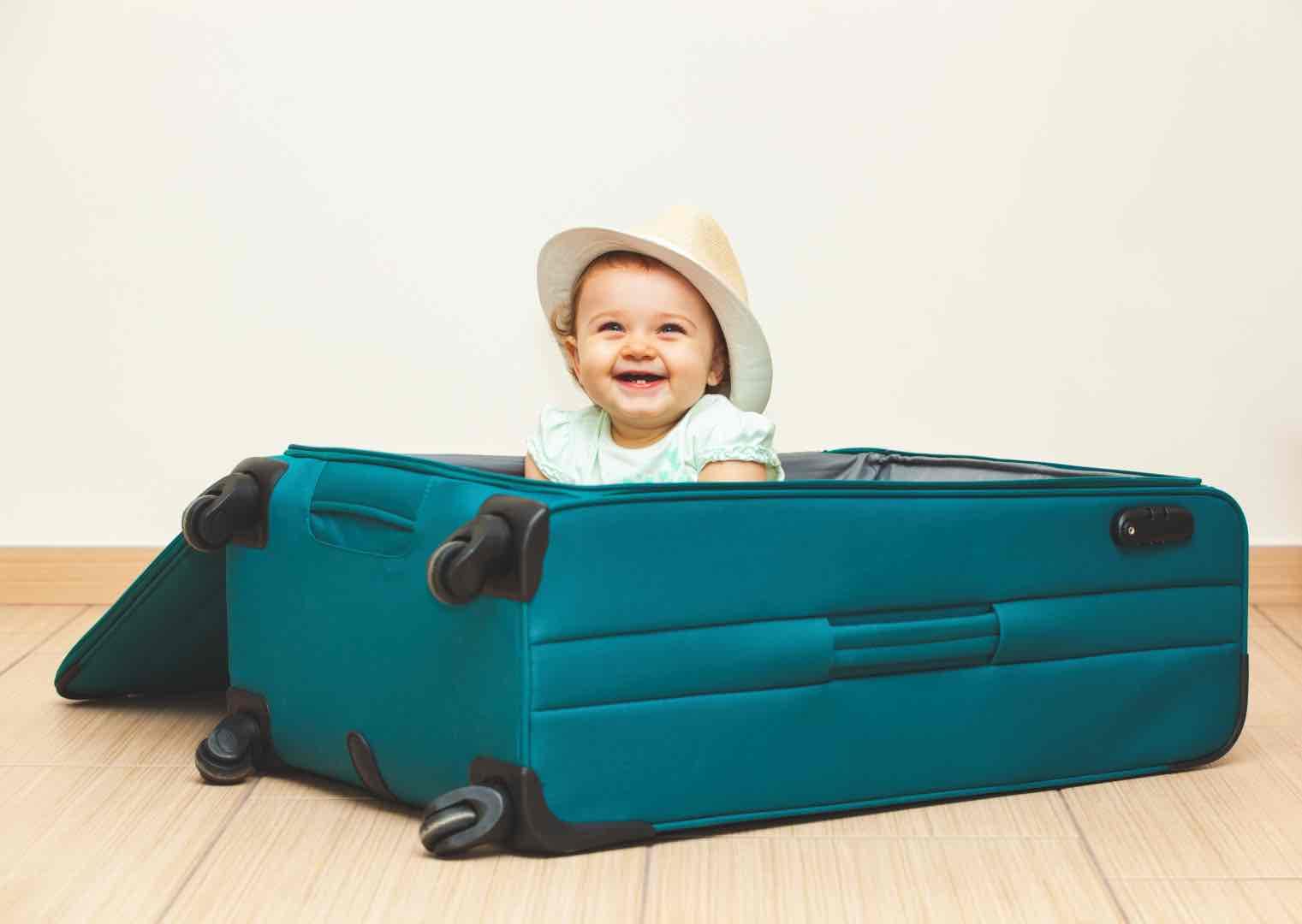 baby in suitcase