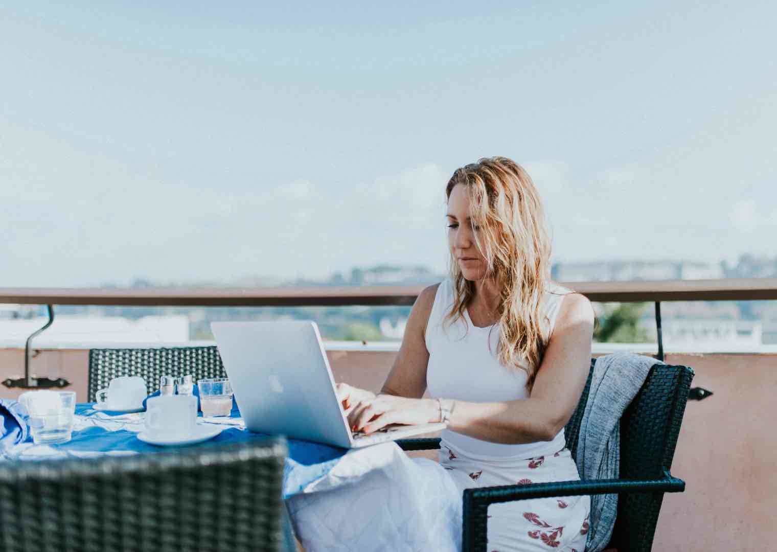 Woman sits while working