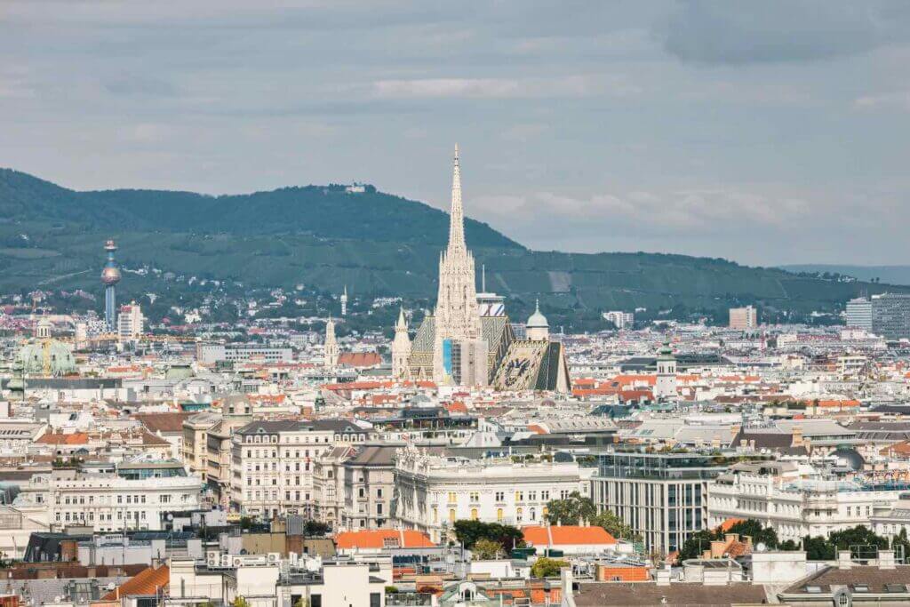 Panoramic view of Vienna's skyline, featuring St. Stephen's Cathedral alongside modern buildings